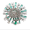 Mid Century 1960's Modern 14kt White Gold Emerald and Diamond Starburst Brooch