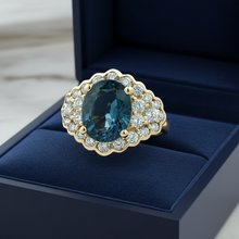  Oval Sapphire, Diamond and 18K Yellow Gold Ring
