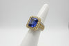 Modern Tanzanite and Diamond Platinum and 18K Yellow Gold Ring