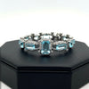 Modern Diamond and Blue Topaz 18K White Gold Bracelet