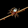 English Blue Topaz,Garnet Spider and 9K Yellow Gold Brooch