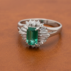 Emerald and Diamond Platinum Halo Ring