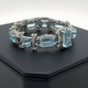 Modern Diamond and Blue Topaz 18K White Gold Bracelet
