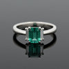 Modern Emerald and Diamond Platinum Ring