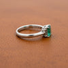 Modern Emerald and Diamond Platinum Ring